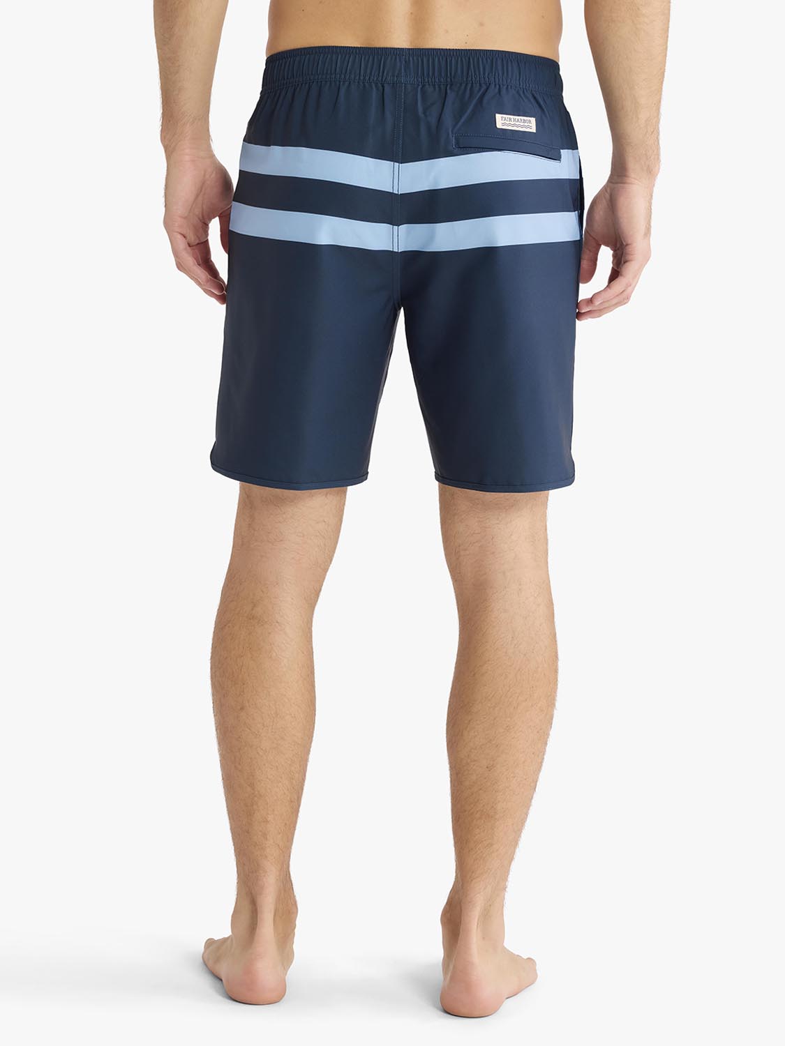 Men's swim trunks in navy with light blue horizontal stripes and elastic waistband.