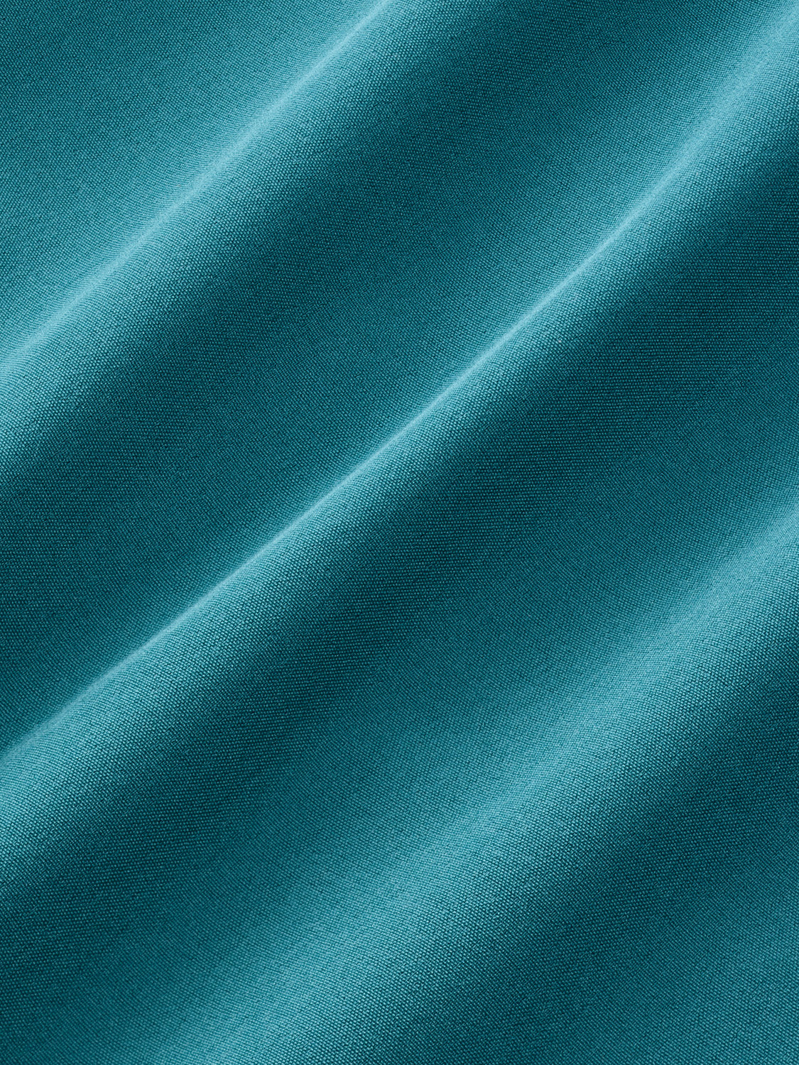 Seapine green textured fabric with diagonal folds and ribbed weave pattern throughout.