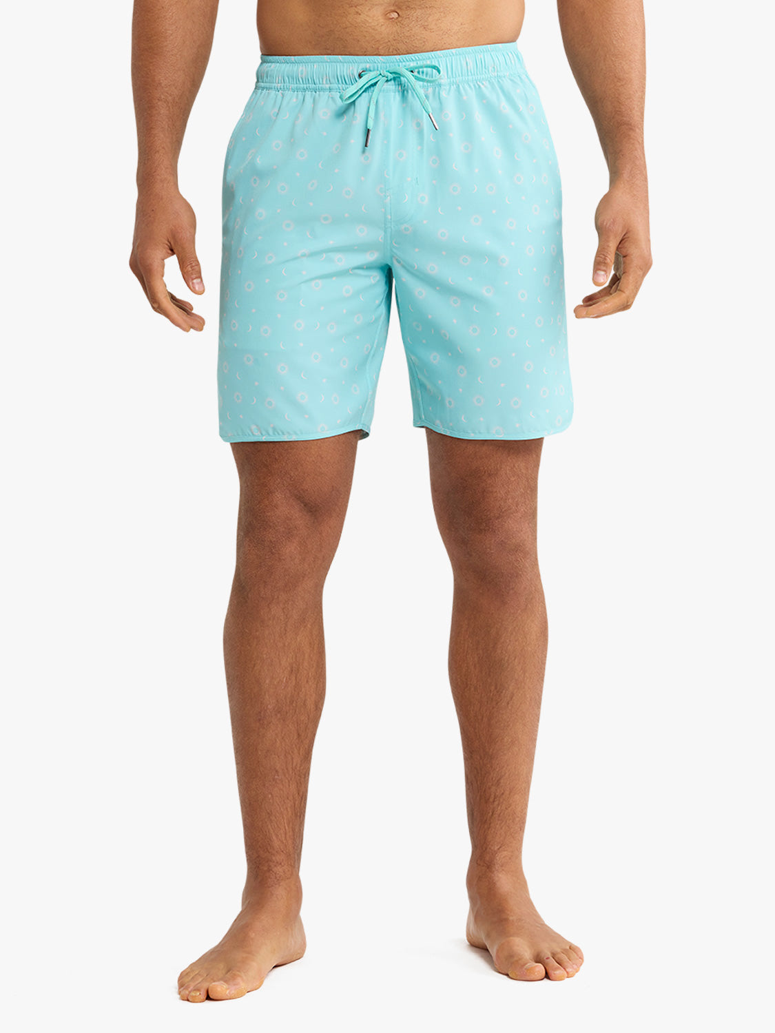 Turquoise swim trunks with white anchor and star pattern and drawstring waistband.