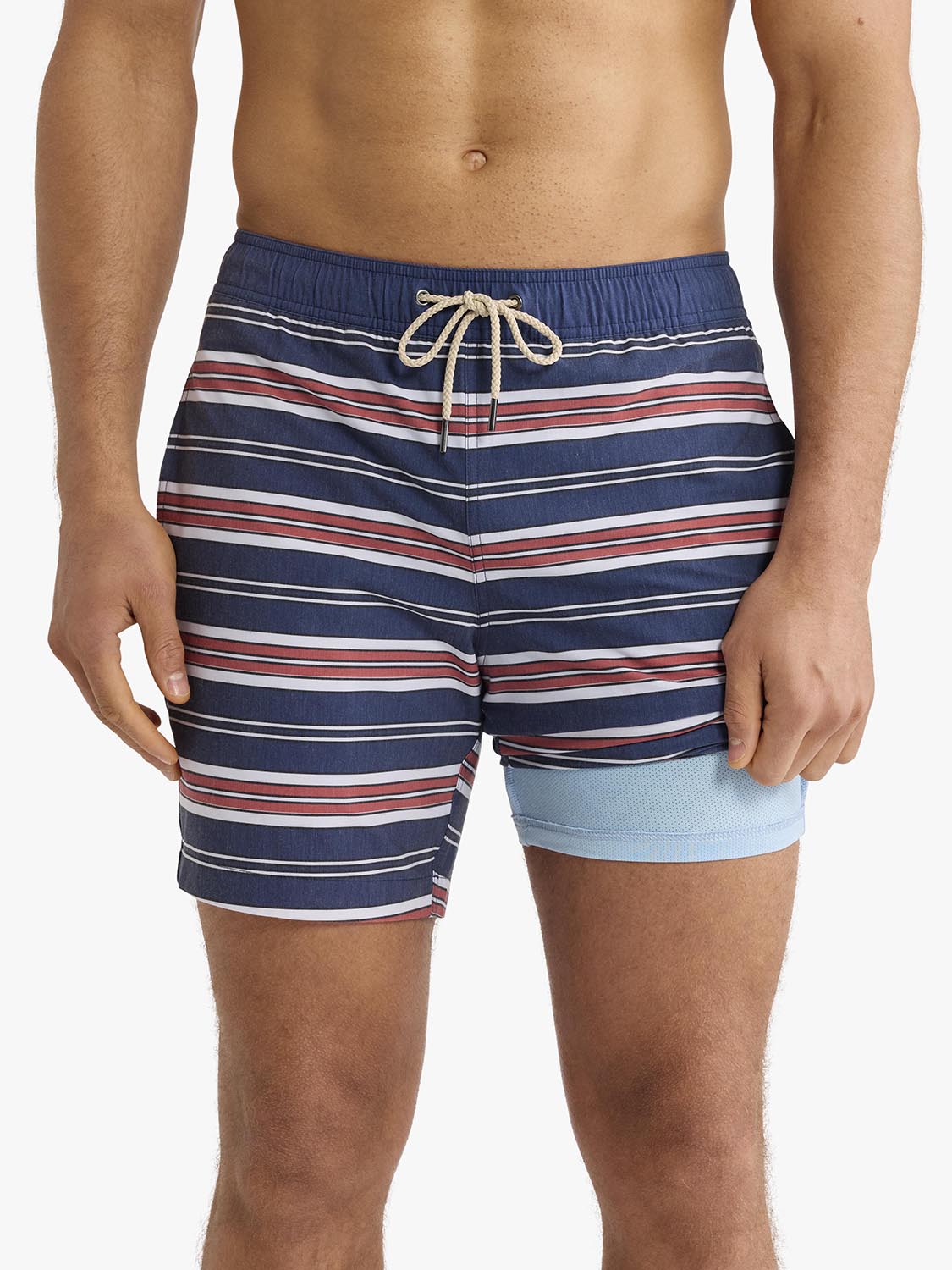 Men's swim trunk with horizontal navy, red, and white stripes and light blue color block on right leg.