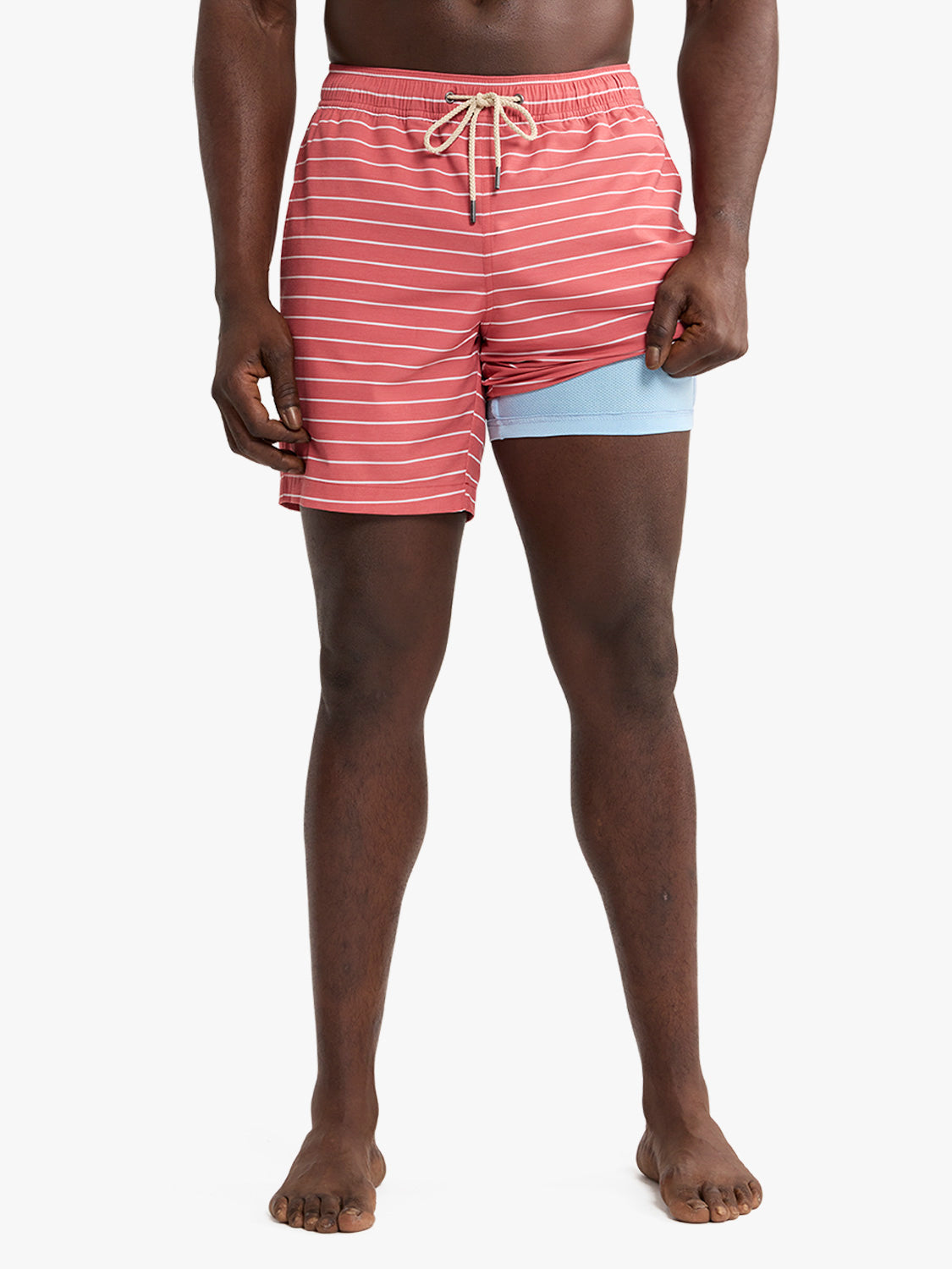Red and white striped swim trunks with light blue liner and drawstring waistband.