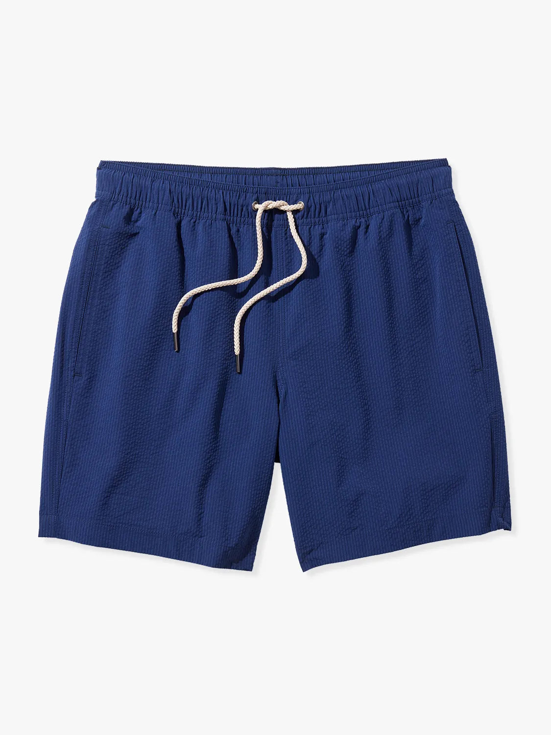 Bayberry swim trunks in Navy blue seersucker with a drawstring waistband and pockets on the sides.