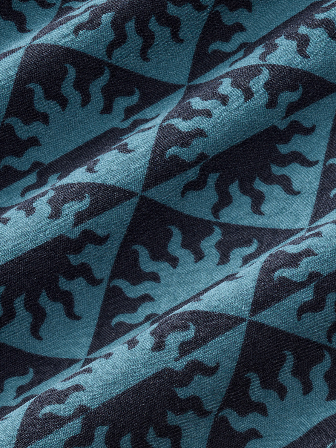 Teal fabric with dark navy animal silhouettes arranged in a repeating diagonal stripe pattern.
