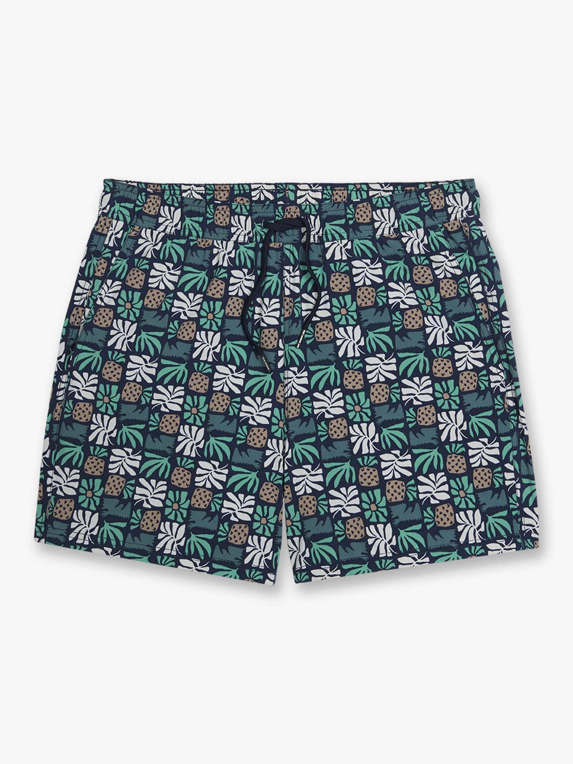 Navy shorts with an all-over palm leaf and pineapple tile pattern in white, green, and tan.
