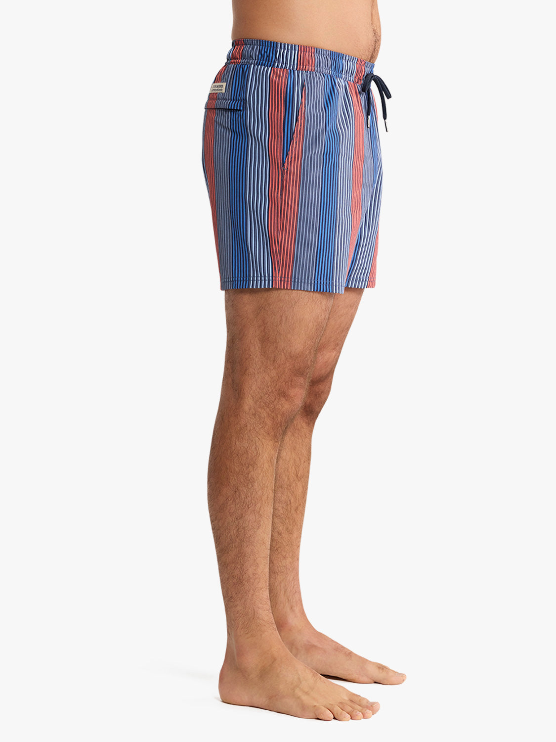 Men's swim trunk with blue and red vertical stripe pattern and drawstring waist.