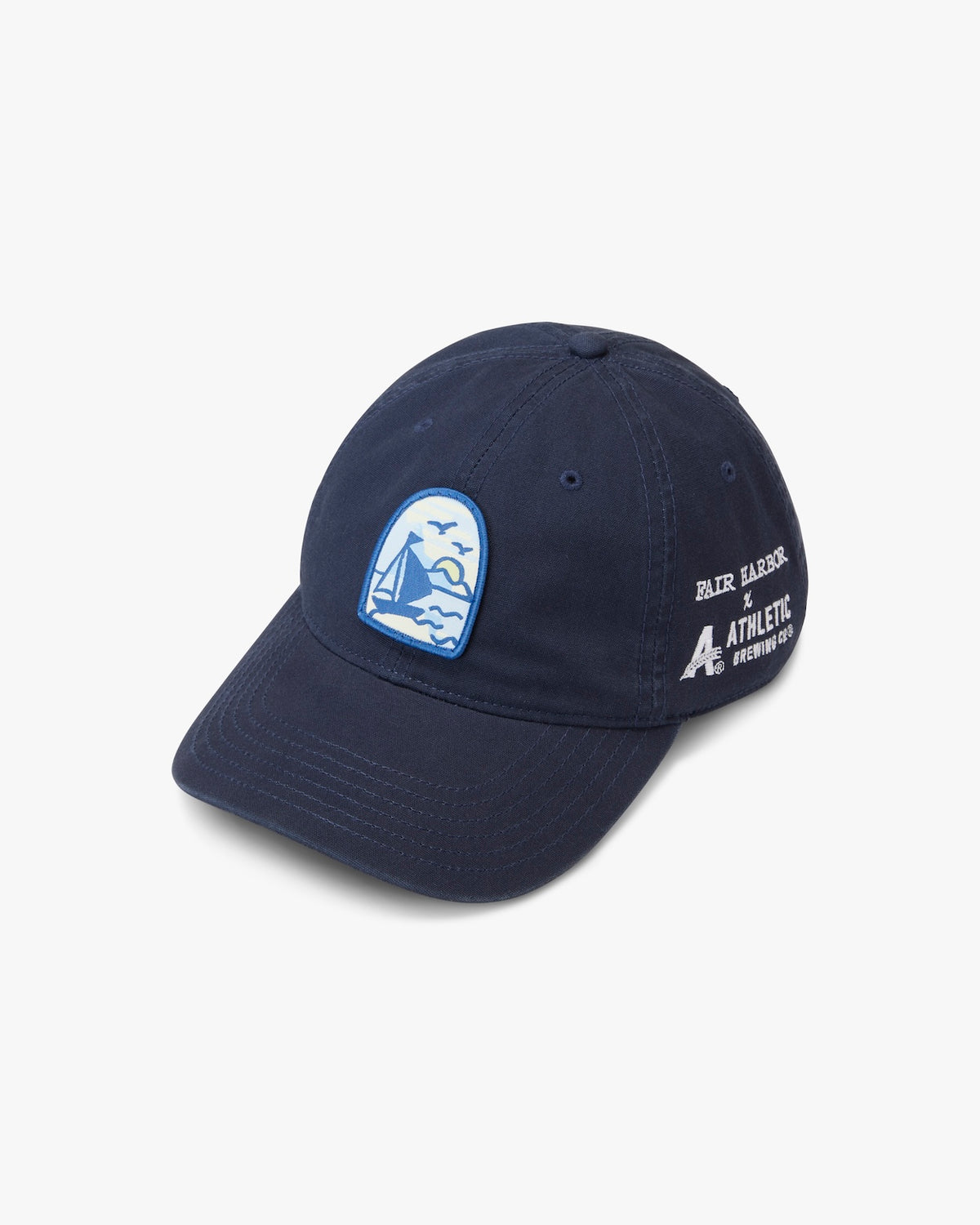 Navy dad hat featuring a blue and white sailboat patch on the front and white text on the side.