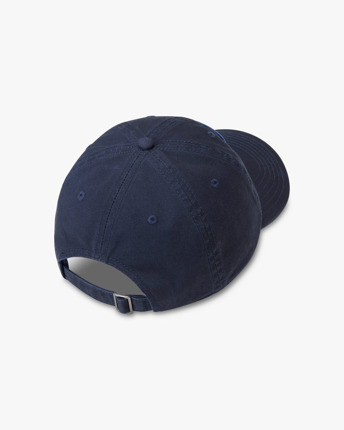 Navy blue dad hat with wavy pattern displayed from front and back angles showing adjustable strap.