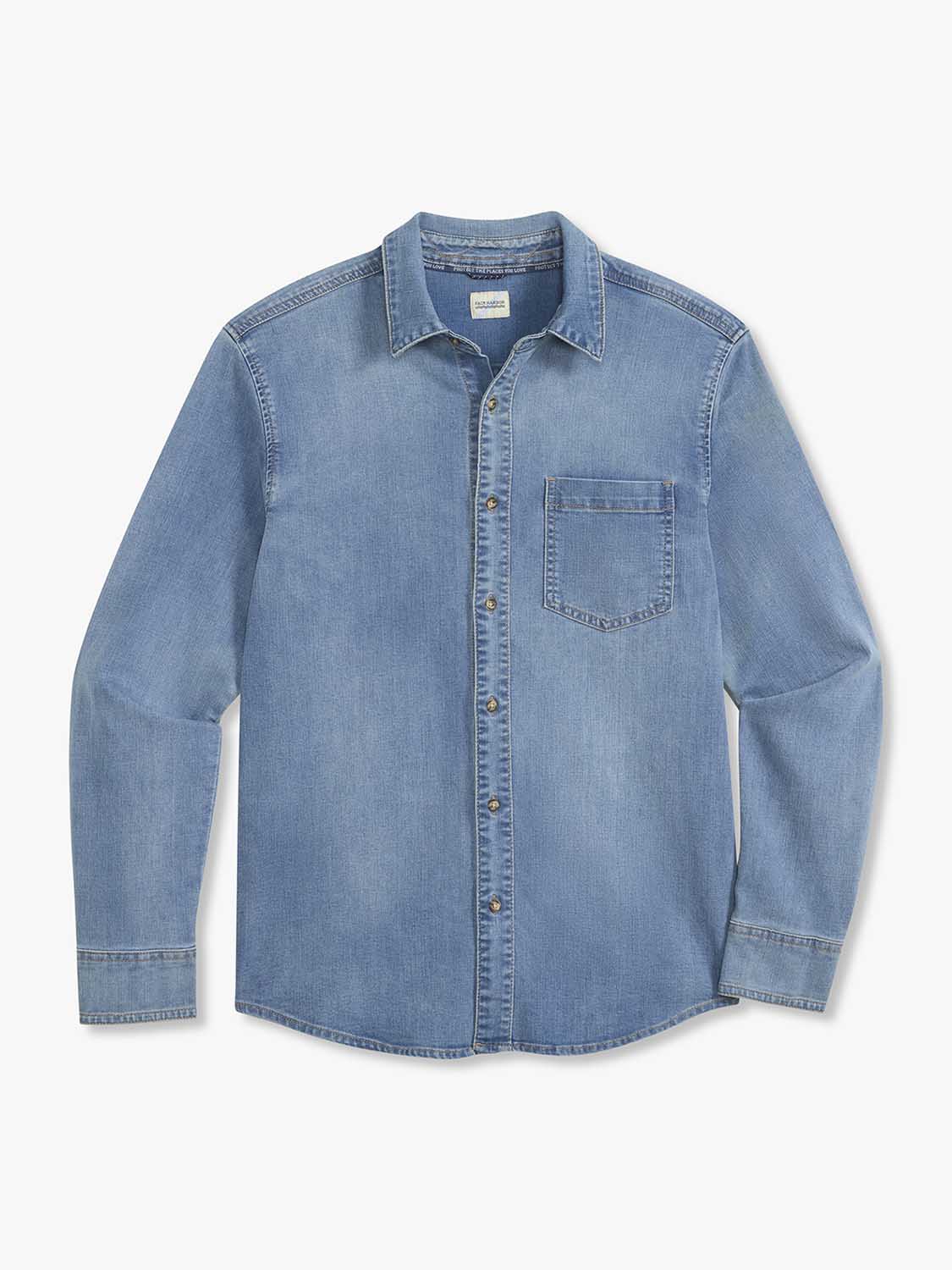 Medium wash denim shirt with long sleeves, chest pocket, and button-front closure displayed flat.