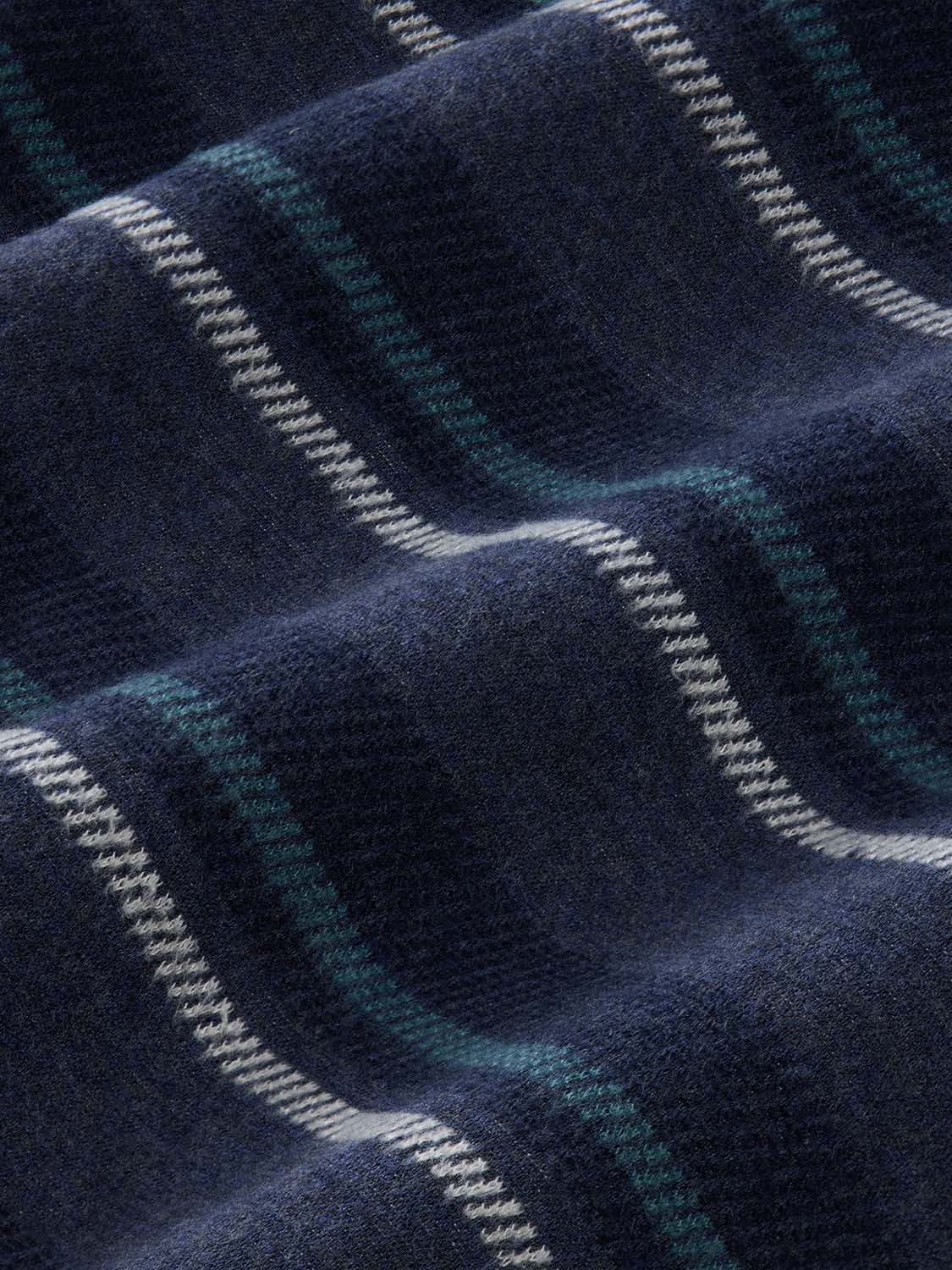 Navy flannel fabric with teal and cream striped pattern in a blanket weave texture.