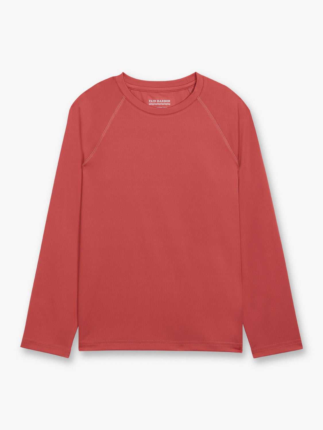 Washed red long-sleeve rashguard with crew neckline and raglan sleeves displayed flat against white background.