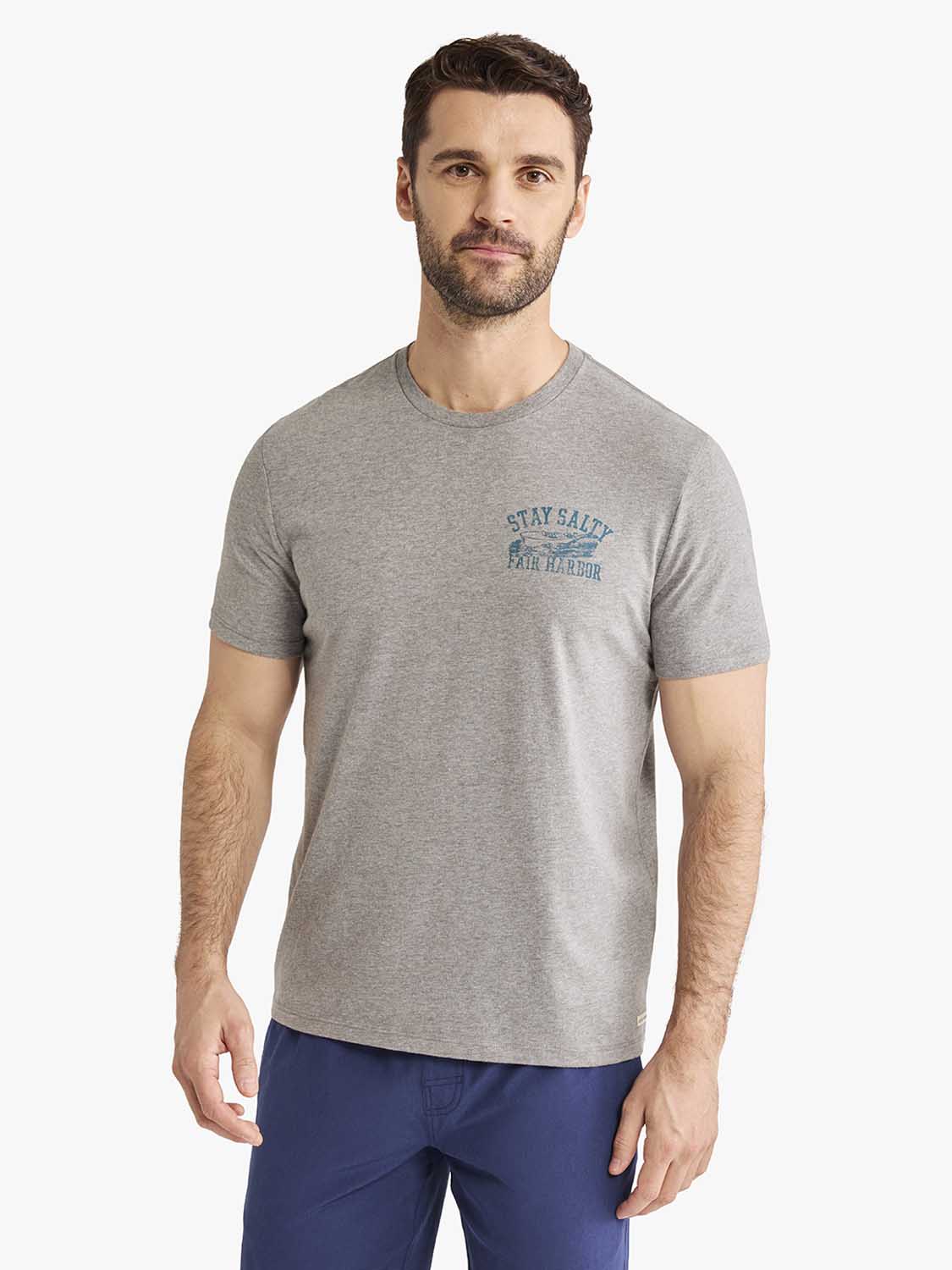 Man wearing heather grey crewneck t-shirt with blue boat graphic and 