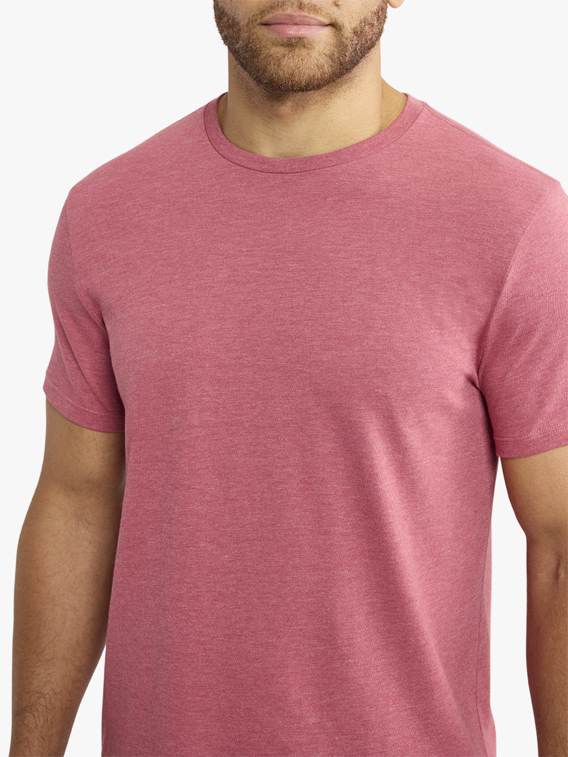 Man wearing a red heathered crewneck short-sleeve t-shirt against a white background.