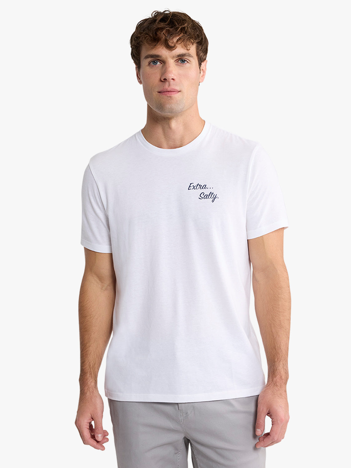Man wearing a white short-sleeve t-shirt with 