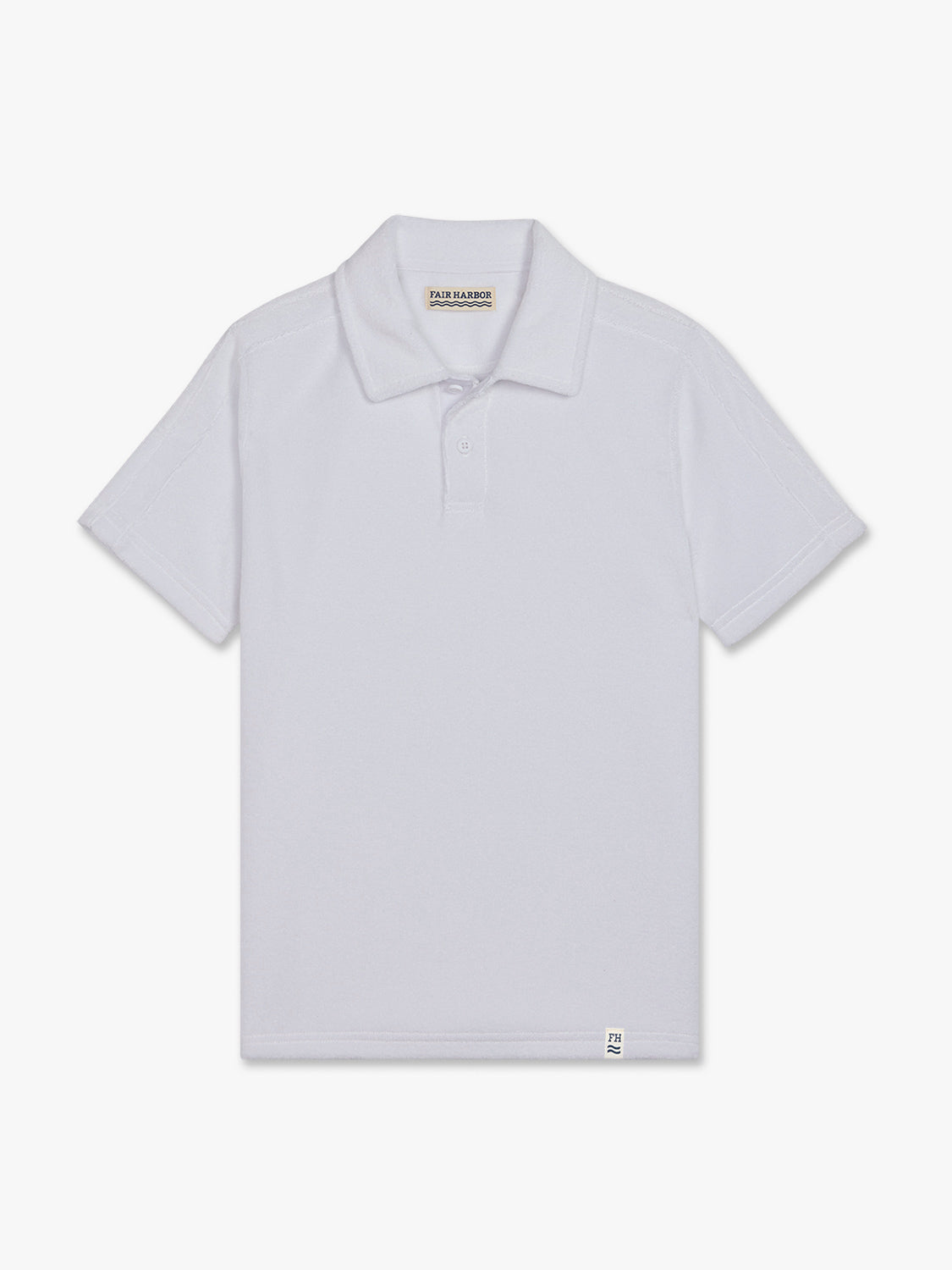 White children's polo shirt with short sleeves, collar, and button front closure displayed flat.