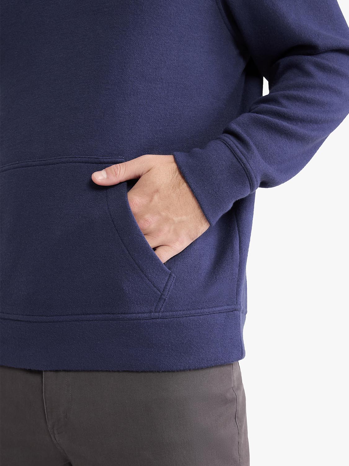 Navy blanket hoodie with ribbed sleeves and a front pocket visible on the torso.