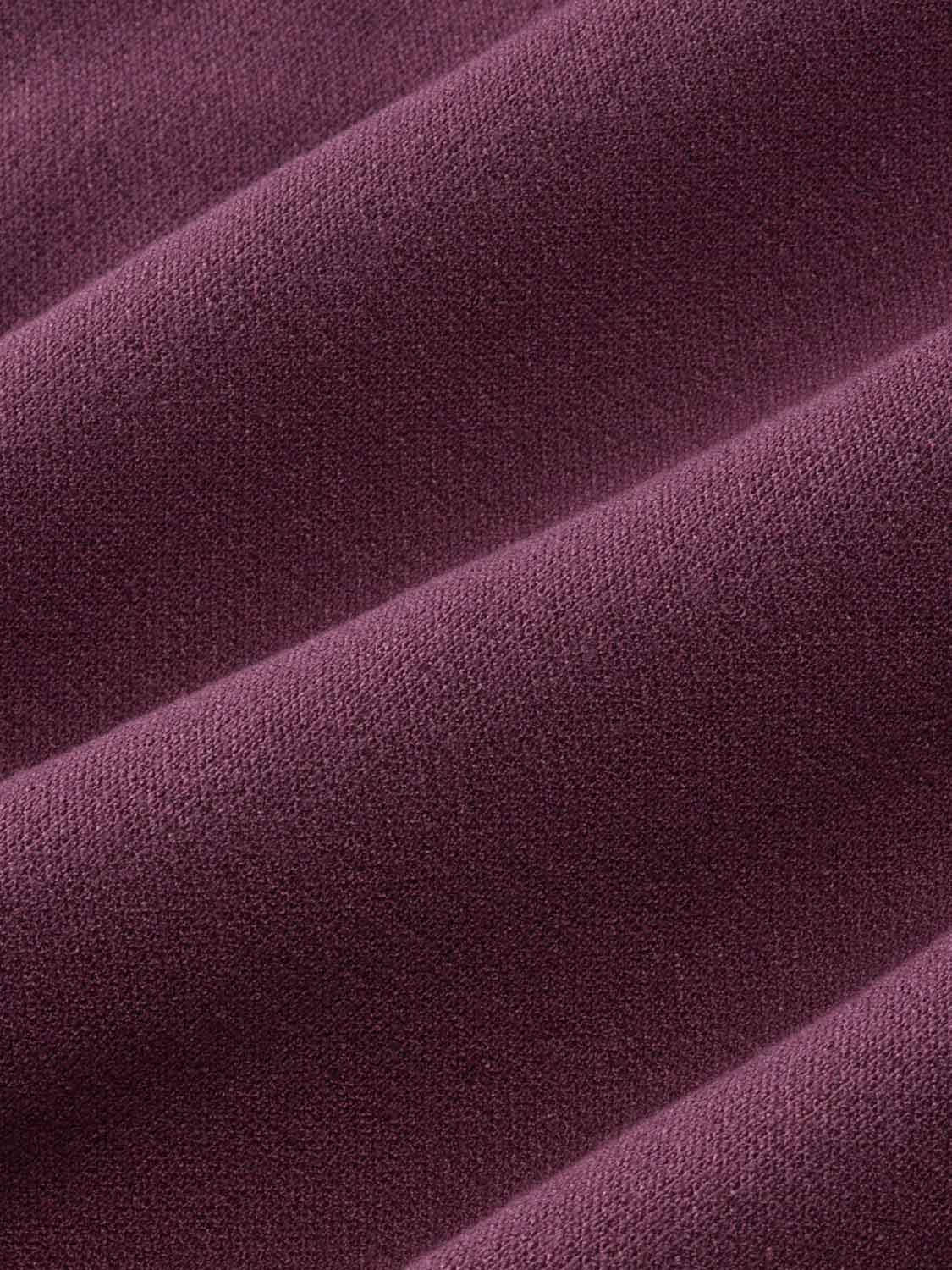 Burgundy blanket hoodie fabric with a soft textured weave and diagonal fold pattern.