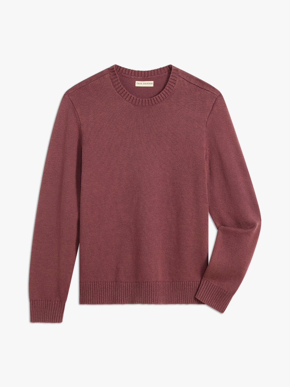 Burgundy crew neck sweater with long sleeves and ribbed cuffs and hem.