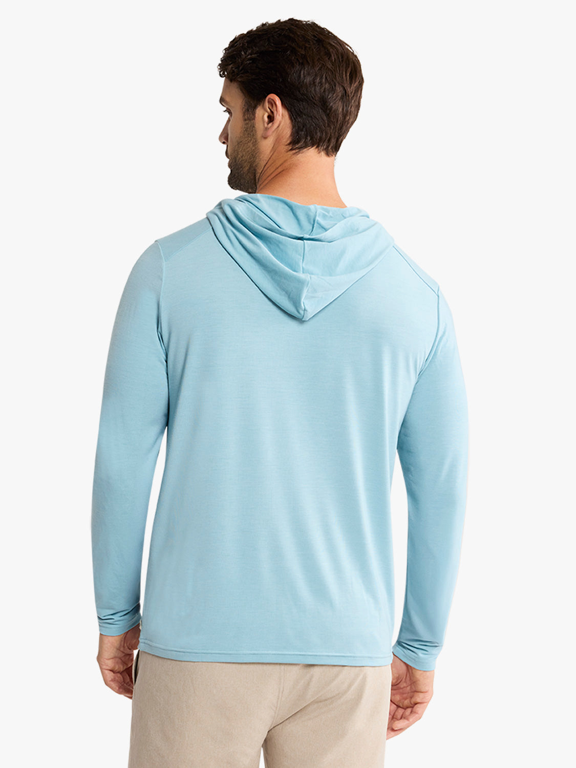 Man wearing a bay blue hoodie with long sleeves, shown from the back view against a white background.