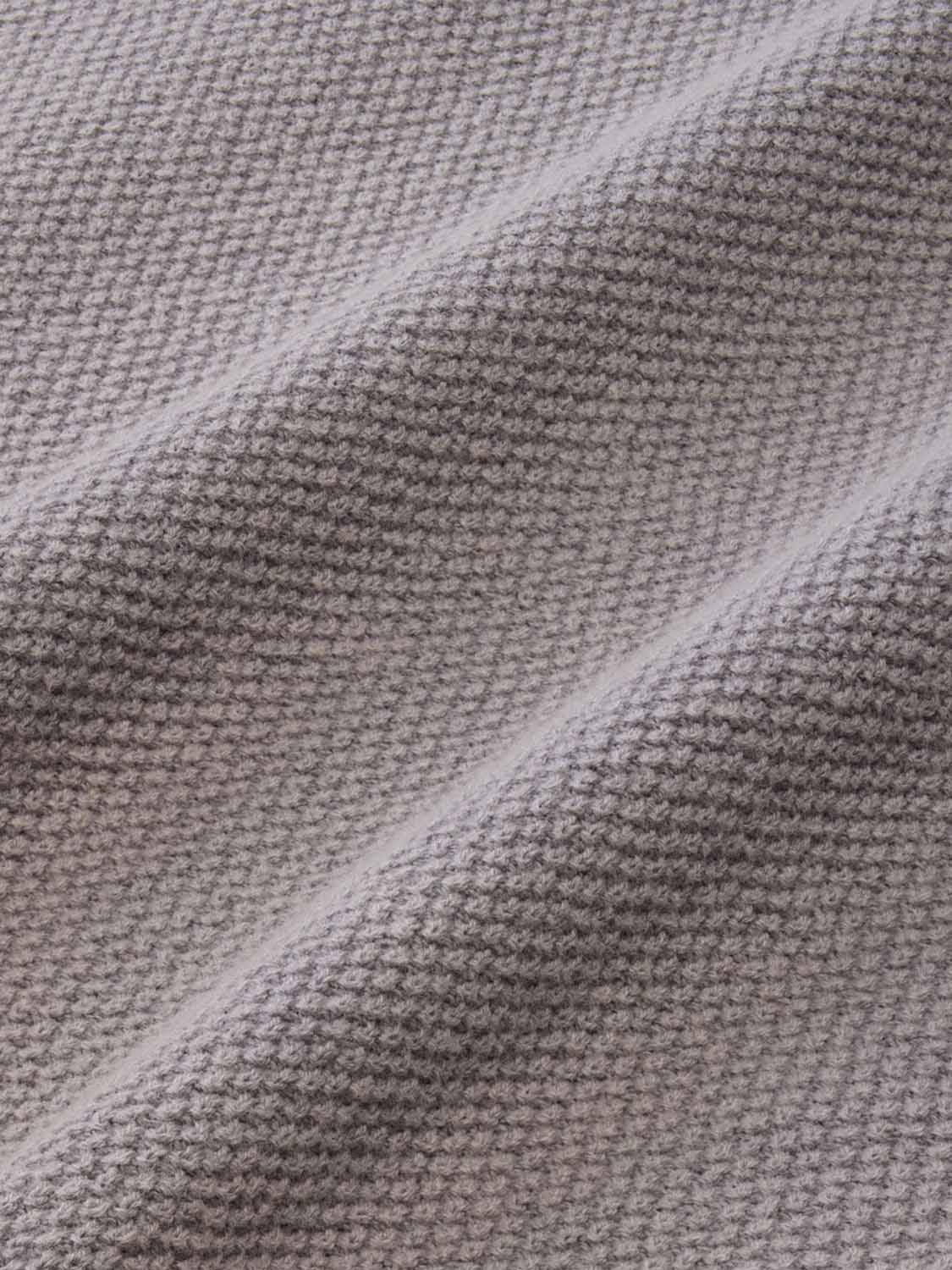 Gray long sleeve polo shirt with textured knit fabric and a subtle striped pattern detail.