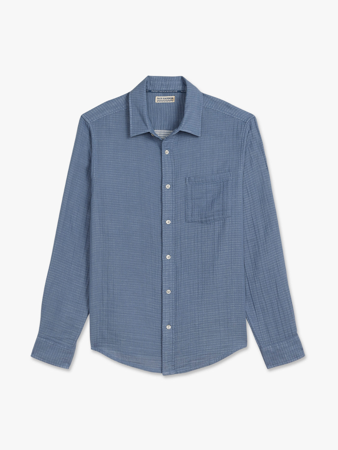 Blue button-up shirt with long sleeves and a chest pocket displayed on a neutral background.