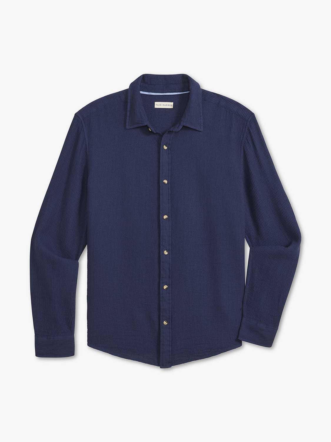 Navy waffle long sleeve button up shirt displayed flat against a white background.