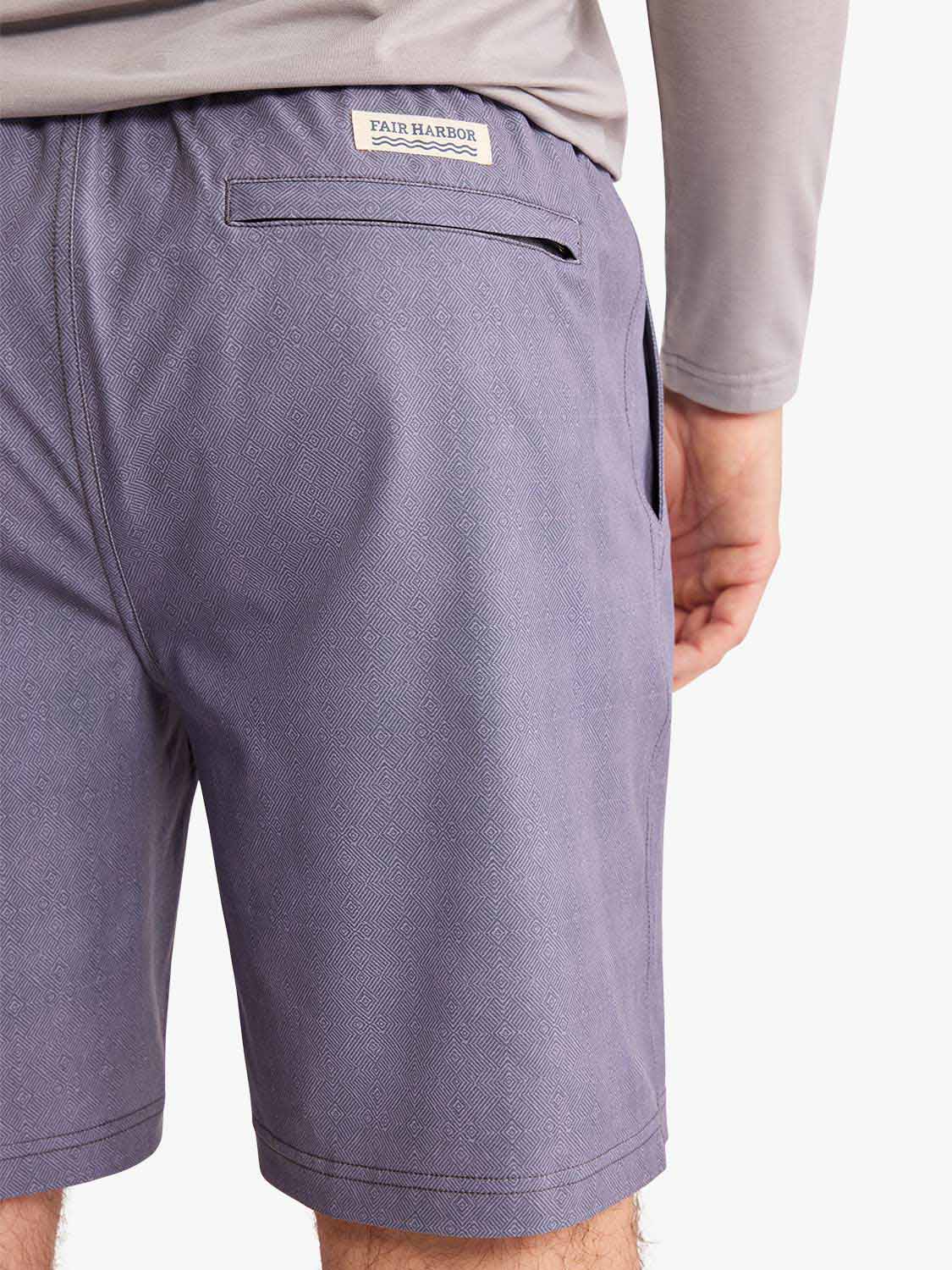 Fair Harbor dusk purple shorts with textured weave pattern worn by model from waist down.