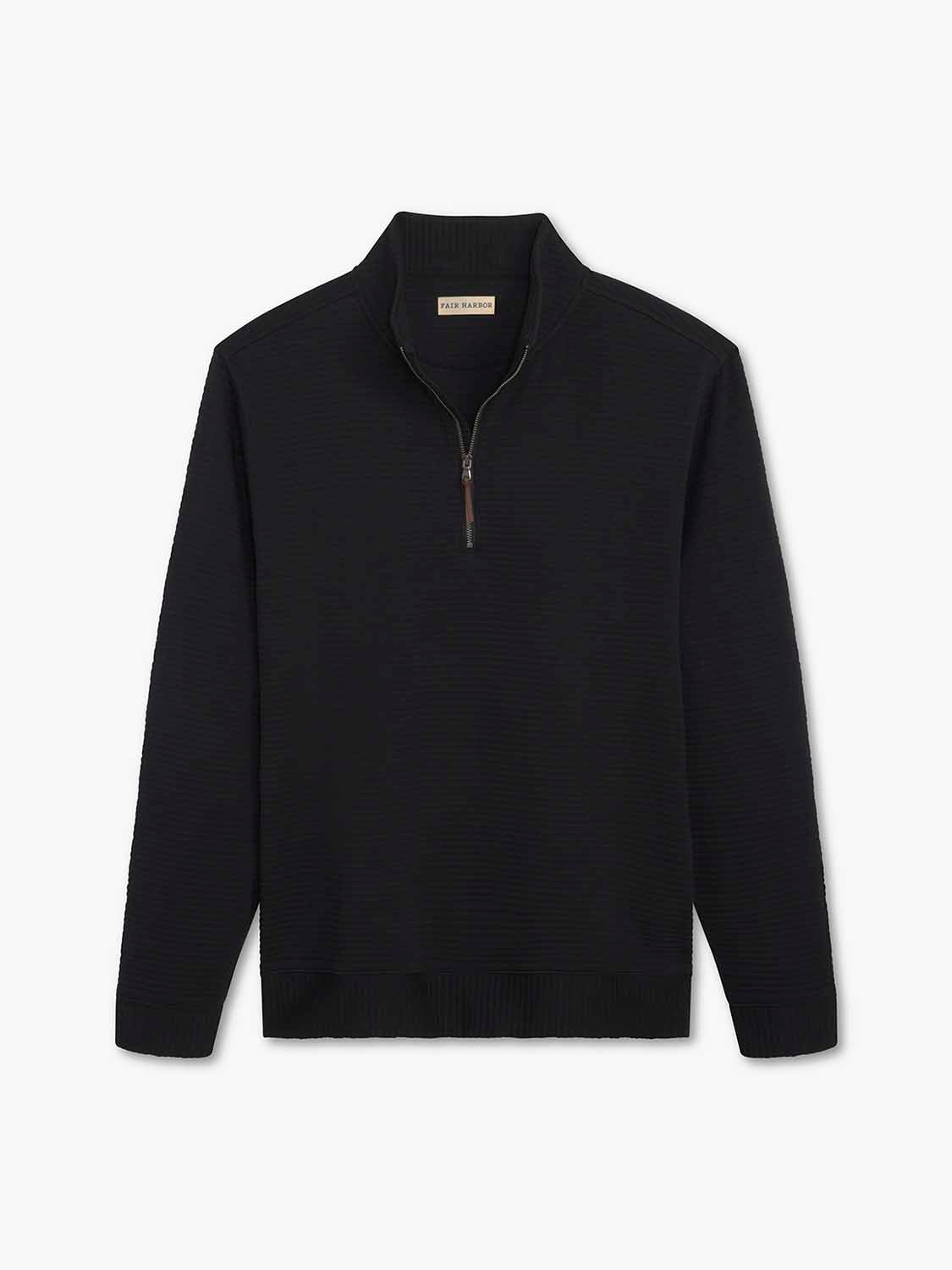 Black quarter zip pullover with long sleeves and a textured knit fabric throughout.