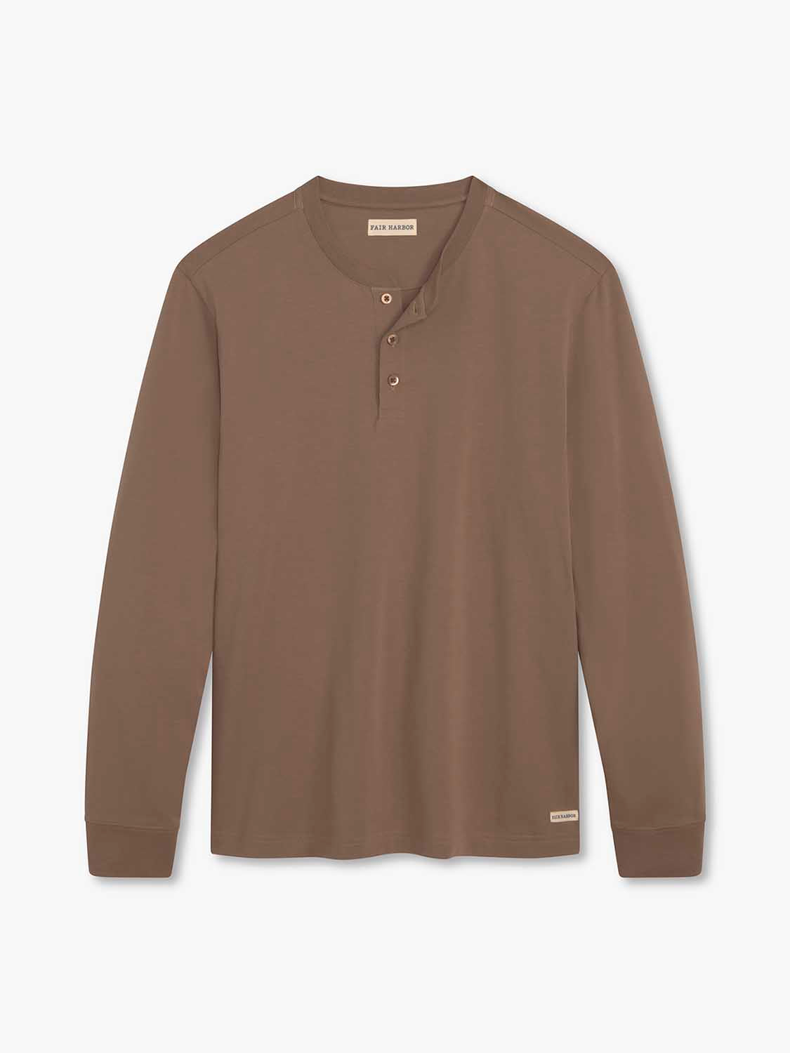 Tan long-sleeved henley shirt with three buttons at the neckline displayed flat against white background.