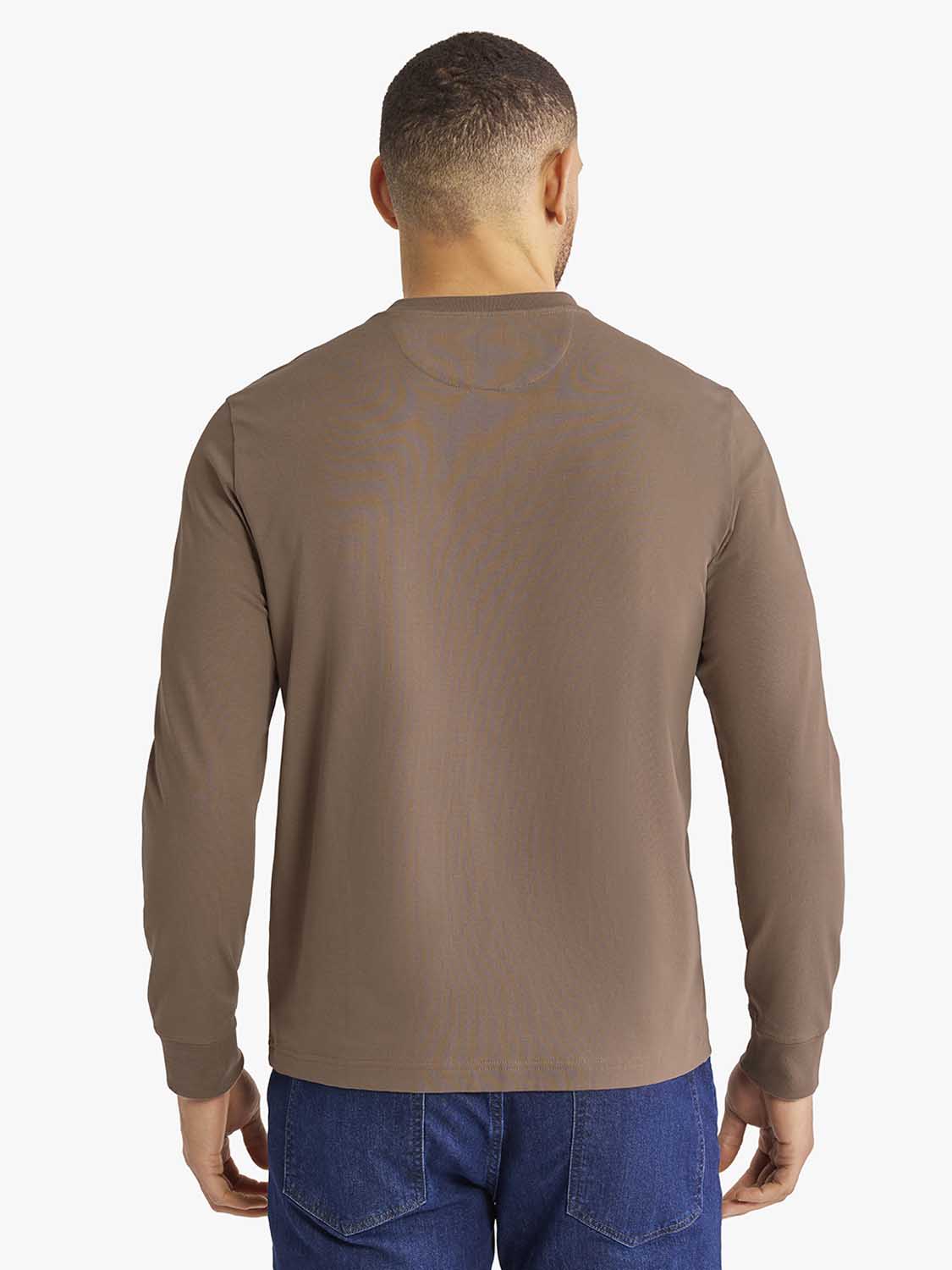 Man wearing a taupe long-sleeve Henley shirt with ribbed crew neckline, shown from behind.