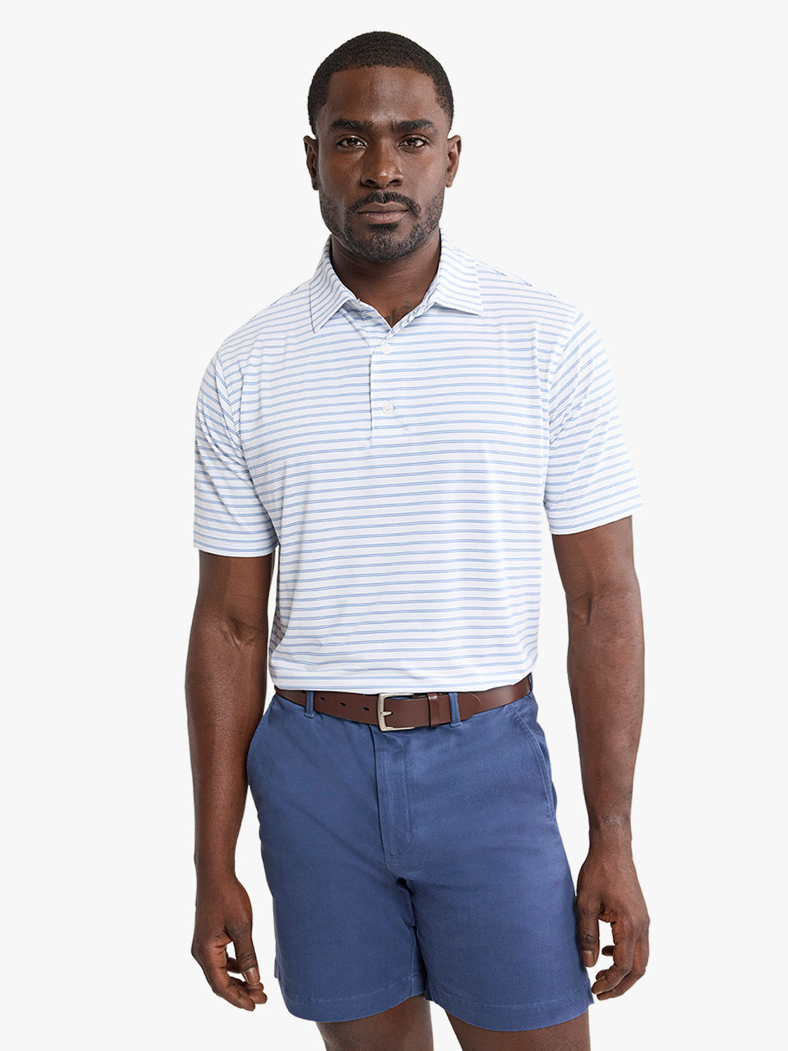 Man wearing a light blue and white striped polo shirt with a collared neckline and button front.