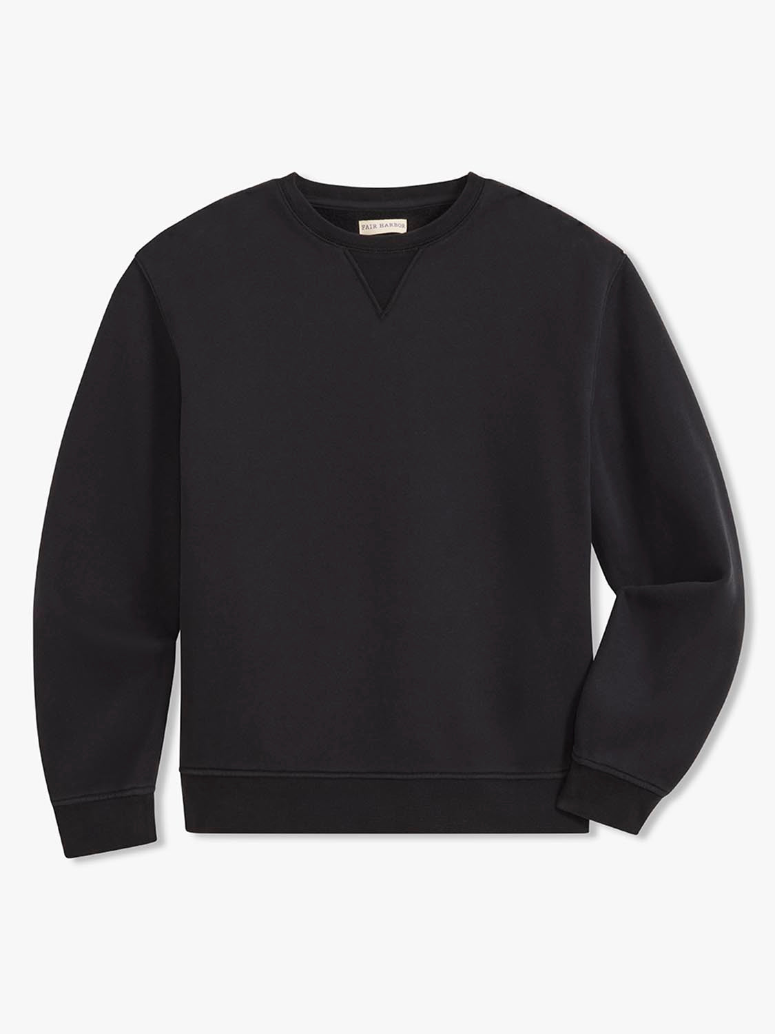 Black crewneck sweatshirt with long sleeves and ribbed cuffs displayed on neutral background.