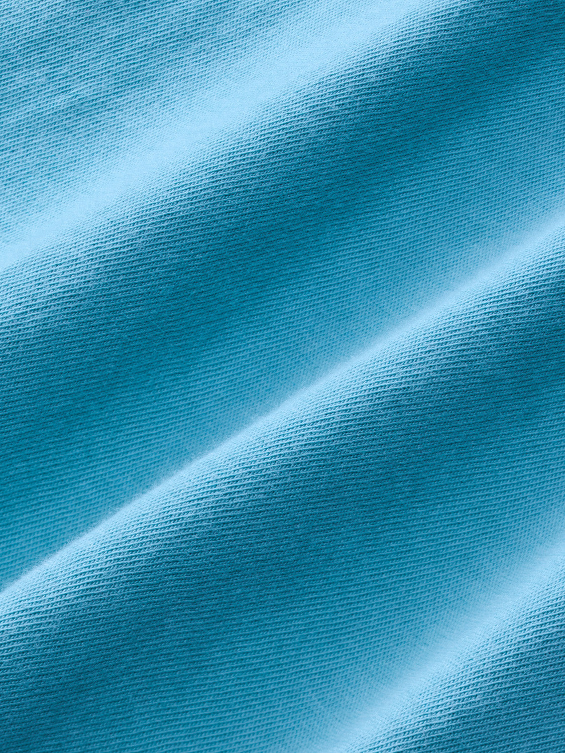 Bay blue textured fabric with diagonal fold lines and ribbed surface detail.