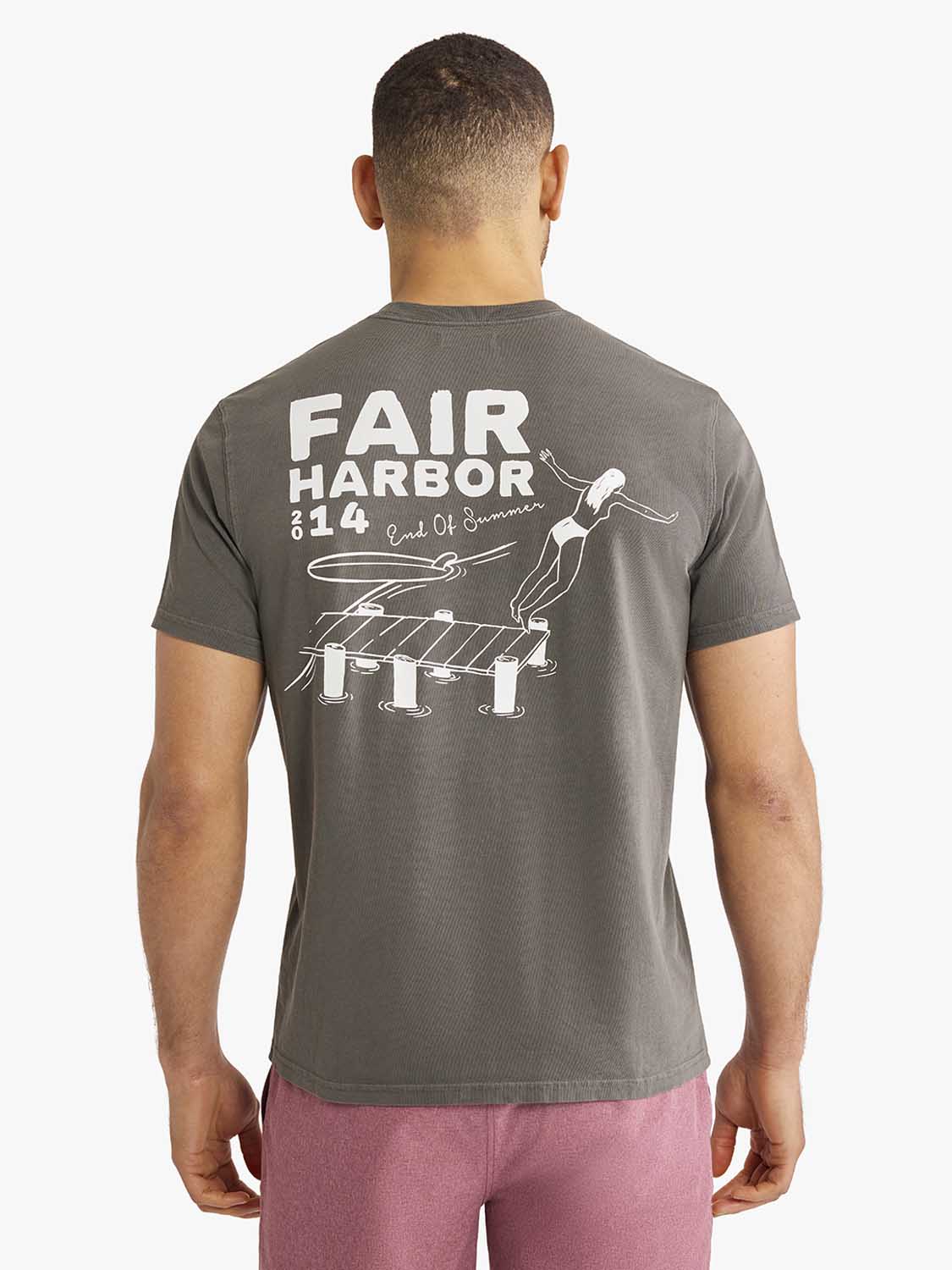 Charcoal gray t-shirt with white graphic print on back depicting Fair Harbor and summer imagery.