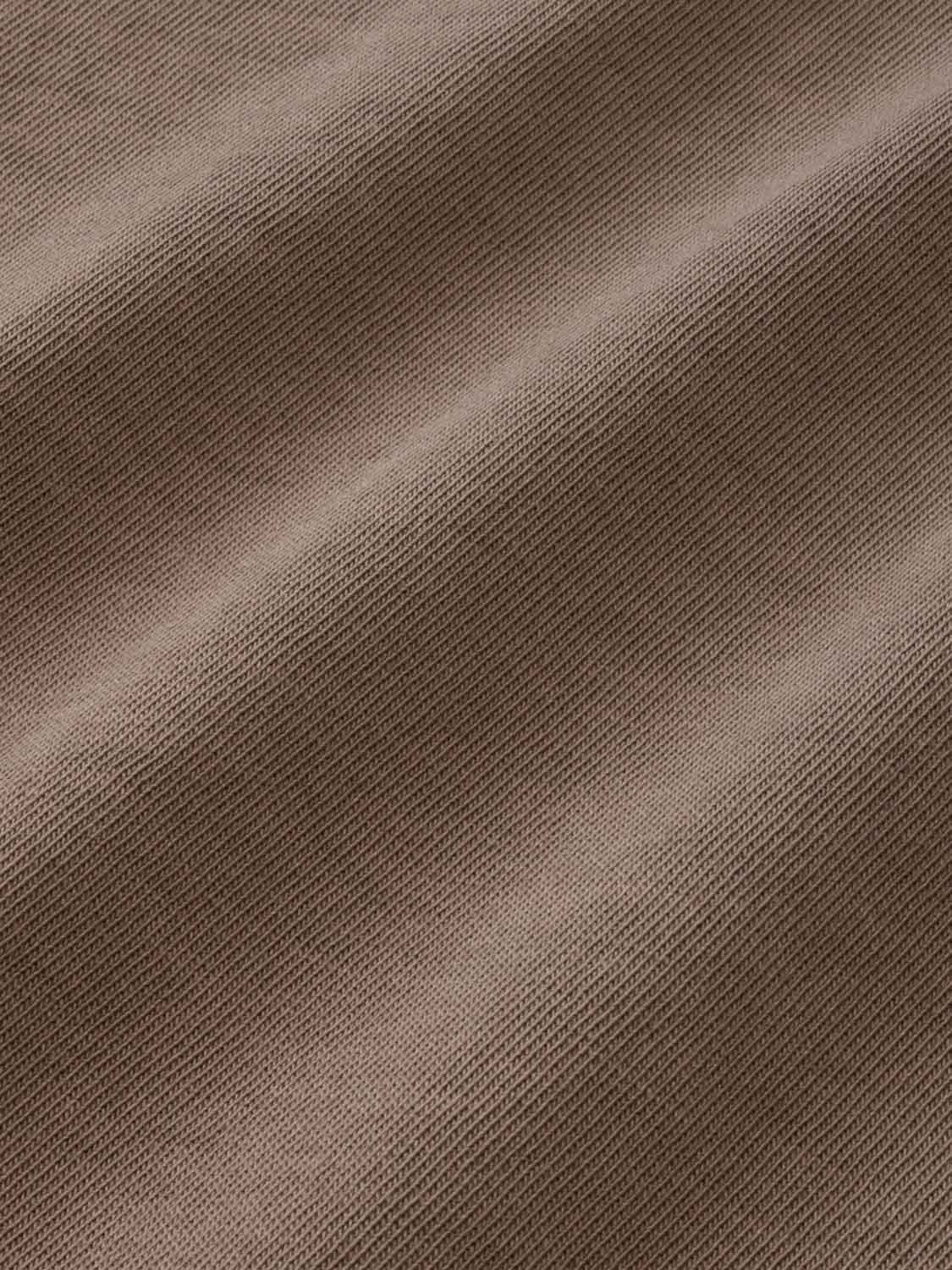 Sandbar-colored long sleeve tee with a textured diagonal knit fabric pattern throughout.