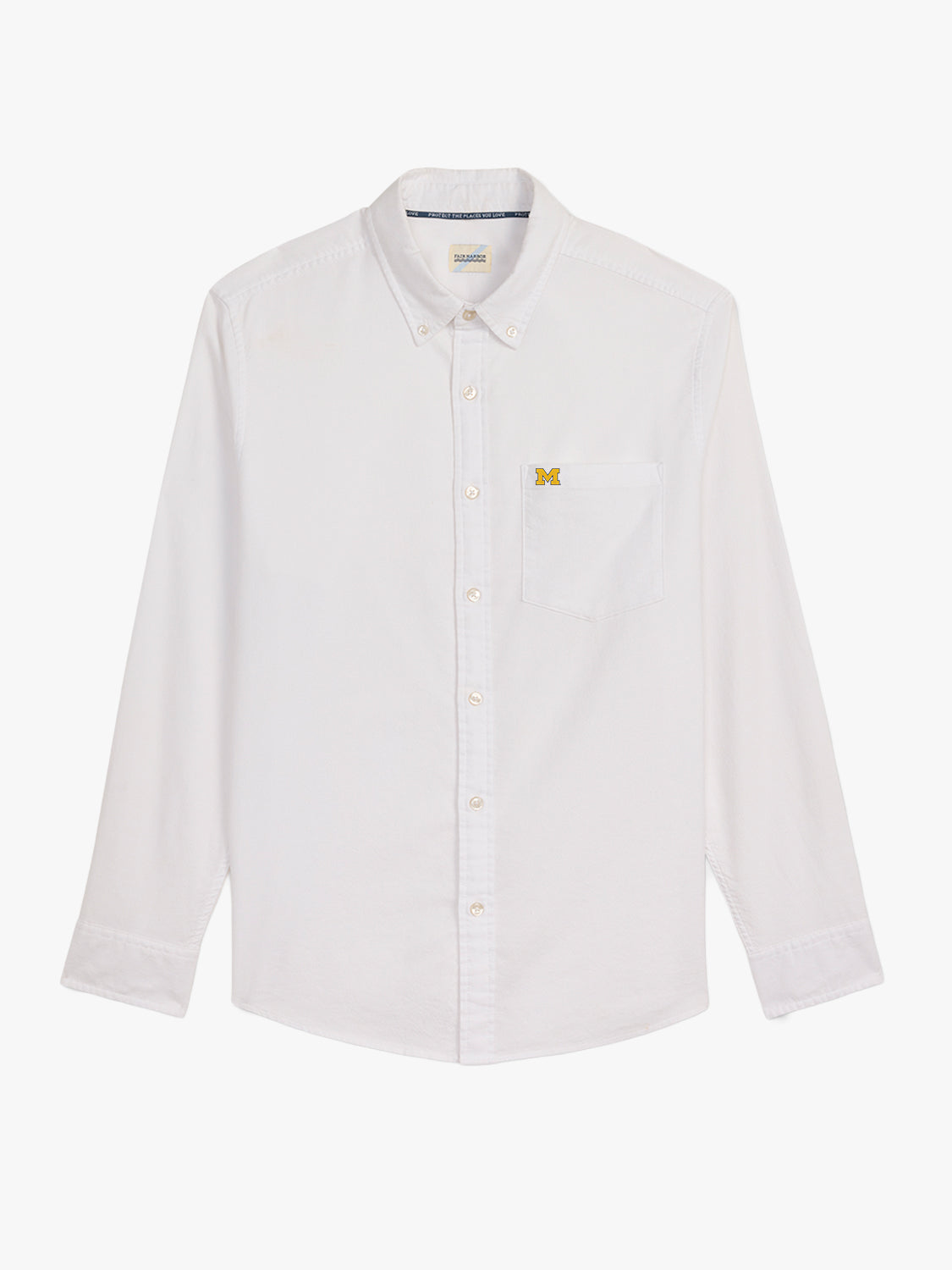 White long-sleeved oxford button-down shirt with University of Michigan M logo on chest pocket.
