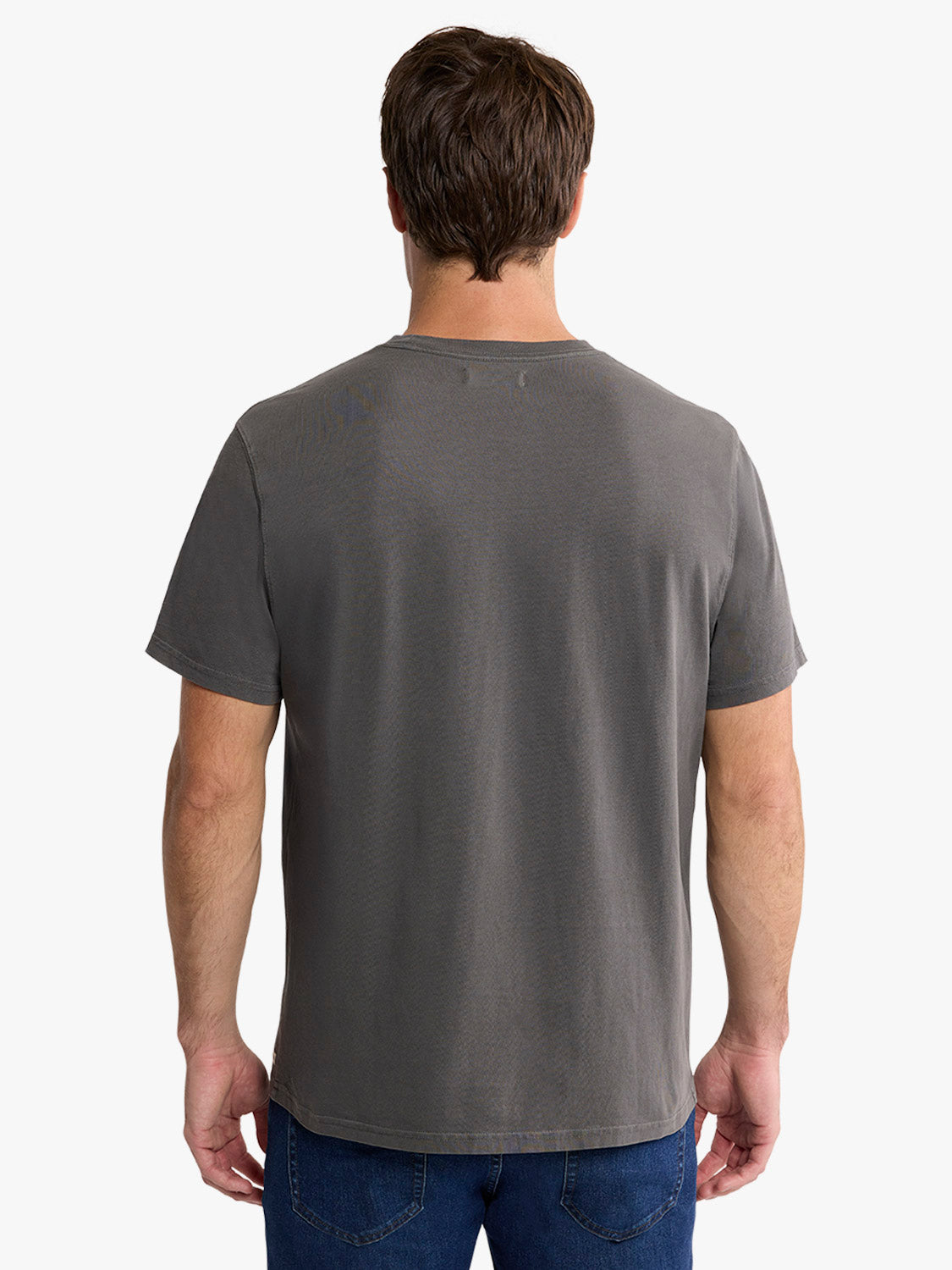 Man wearing a charcoal gray short-sleeved t-shirt, shown from the back view.