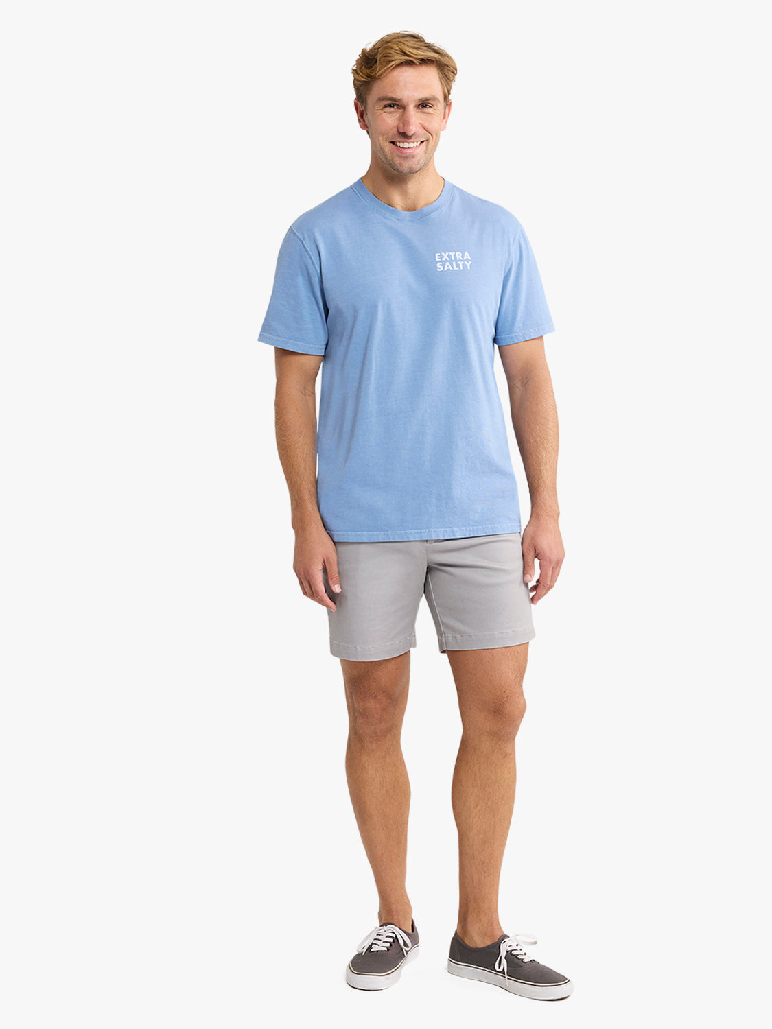Man wearing a light blue short-sleeve graphic tee with 