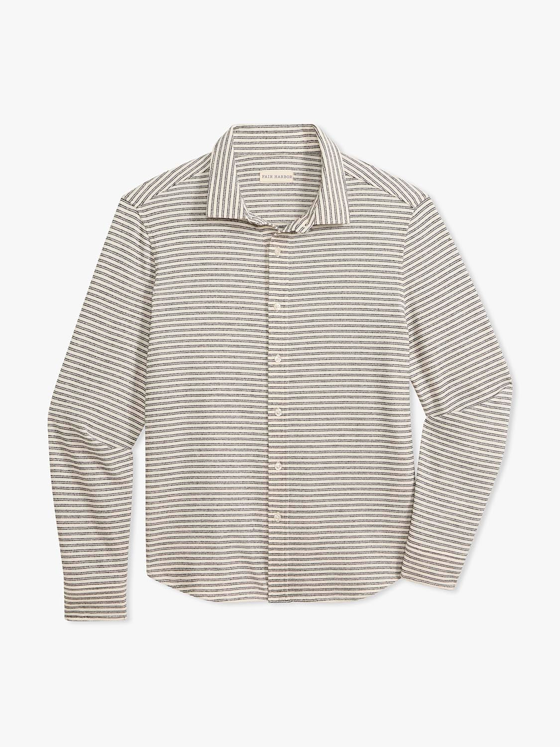 Tan and white striped button-up shirt with long sleeves and a collar on a light background.