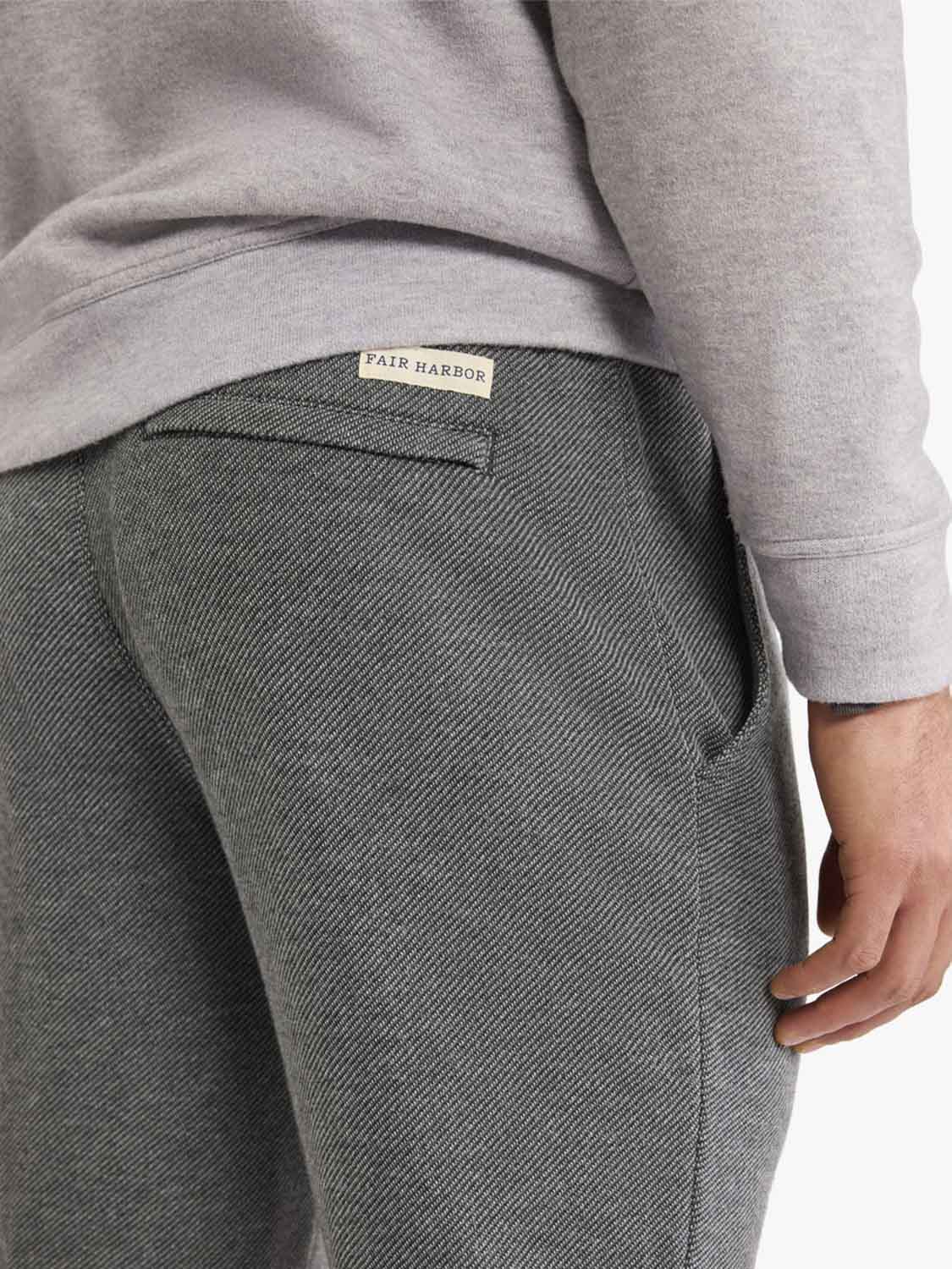 Charcoal sweatpants with ribbed texture and Fair Harbor brand label at waistband.