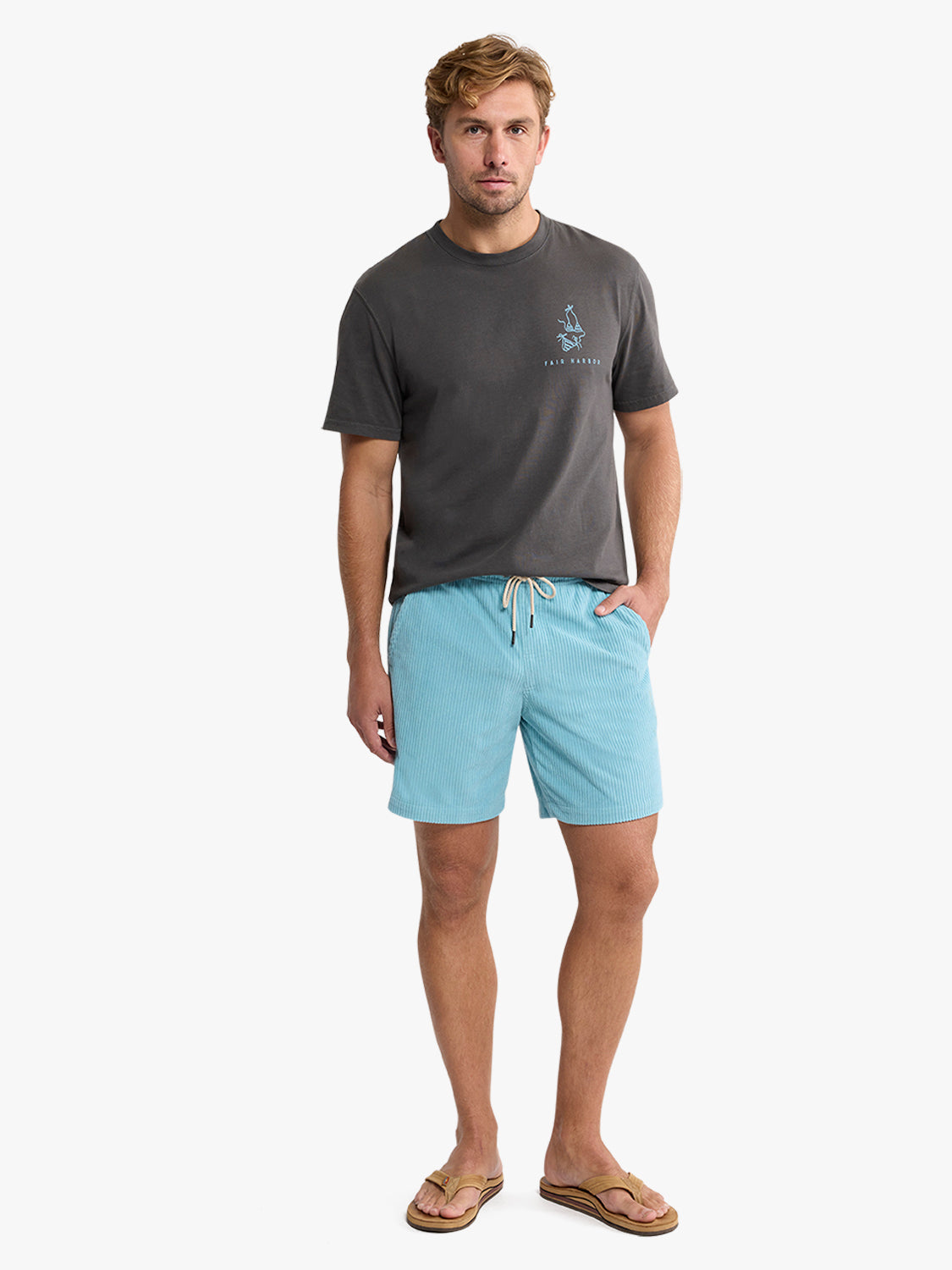 Man wearing gray t-shirt and bay blue corduroy shorts with drawstring waist and sandals.